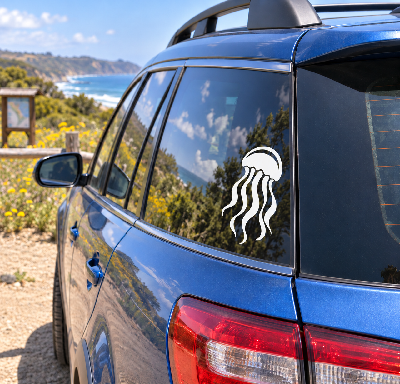 Glowing jellyfish vinyl decal on car window, white outline