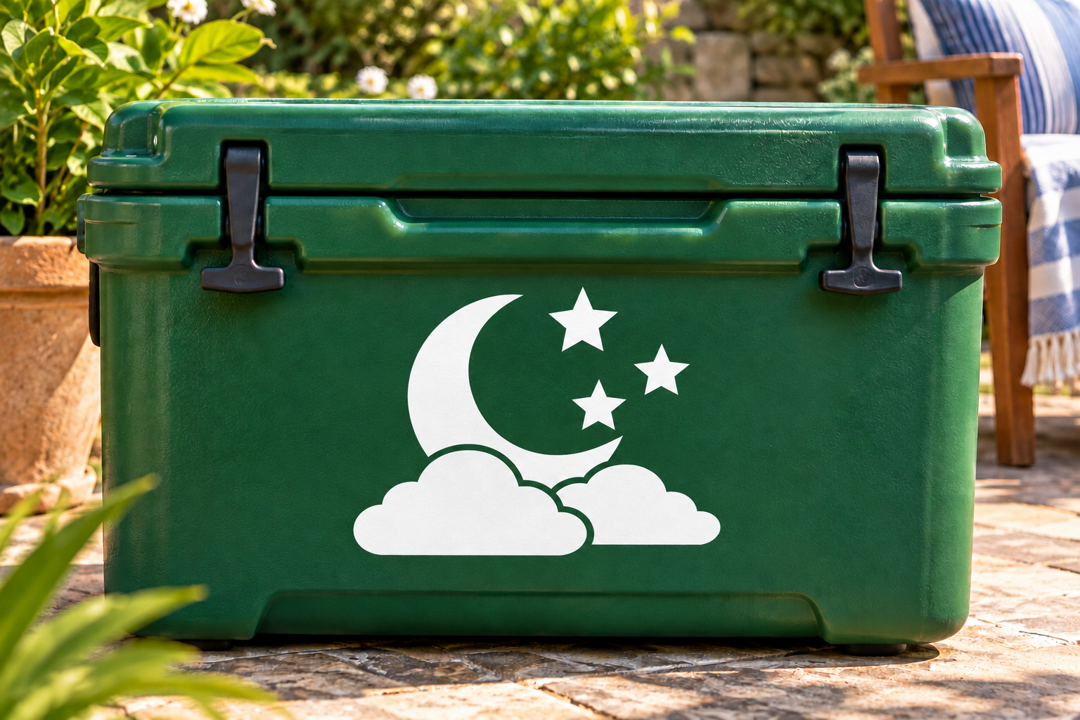 Glow-in-the-dark vinyl decal with moon, clouds, and stars on a green surface
