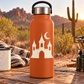 Orange bottle with white castle-and-moon glow-in-the-dark vinyl decal