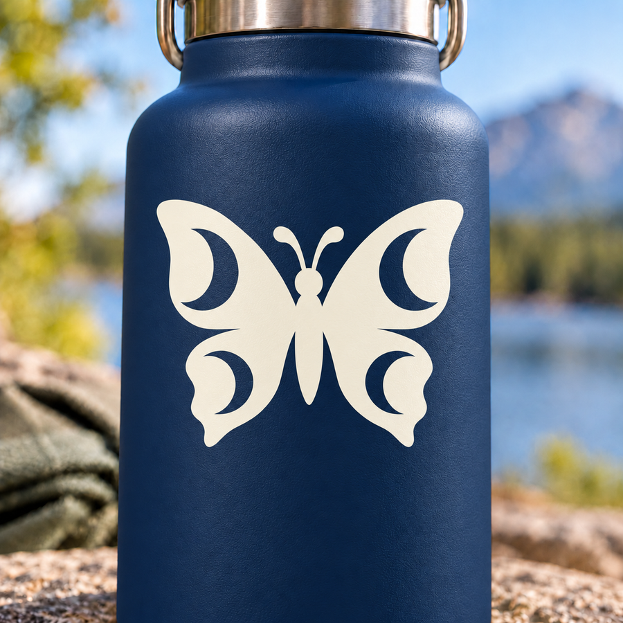 Glow-in-the-dark vinyl butterfly decal with moon phases, white on dark blue