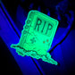 glow in the dark custom vinyl sticker featuring a game tombstone illustration