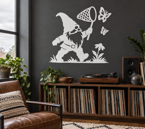 Light gray vinyl gnome decal holding a butterfly net with butterflies, grass, and flowers