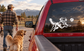 Fetch champion vinyl decal of a golden retriever leaping and reaching, in white on glass