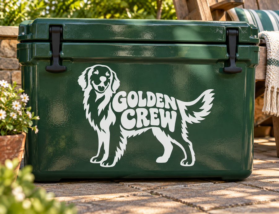 Golden retriever vinyl decal with “GOLDEN CREW” text on a green surface