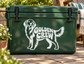 Golden retriever vinyl decal with “GOLDEN CREW” text on a green surface
