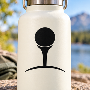 Black golf tee icon vinyl decal on pale surface, circular head with tee silhouette