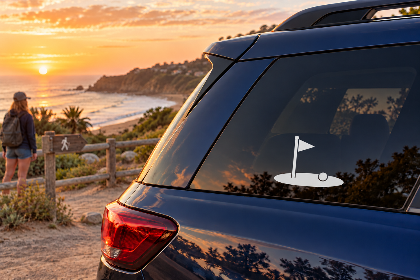 Golf flag and green vinyl decal on car rear window, with flag and small putting green