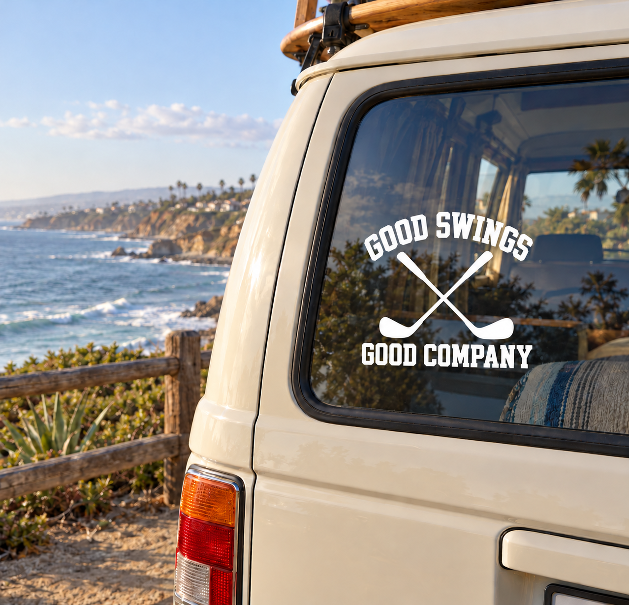 Vinyl golf decal on car window: “GOOD SWINGS” with crossed clubs and “GOOD COMPANY”.