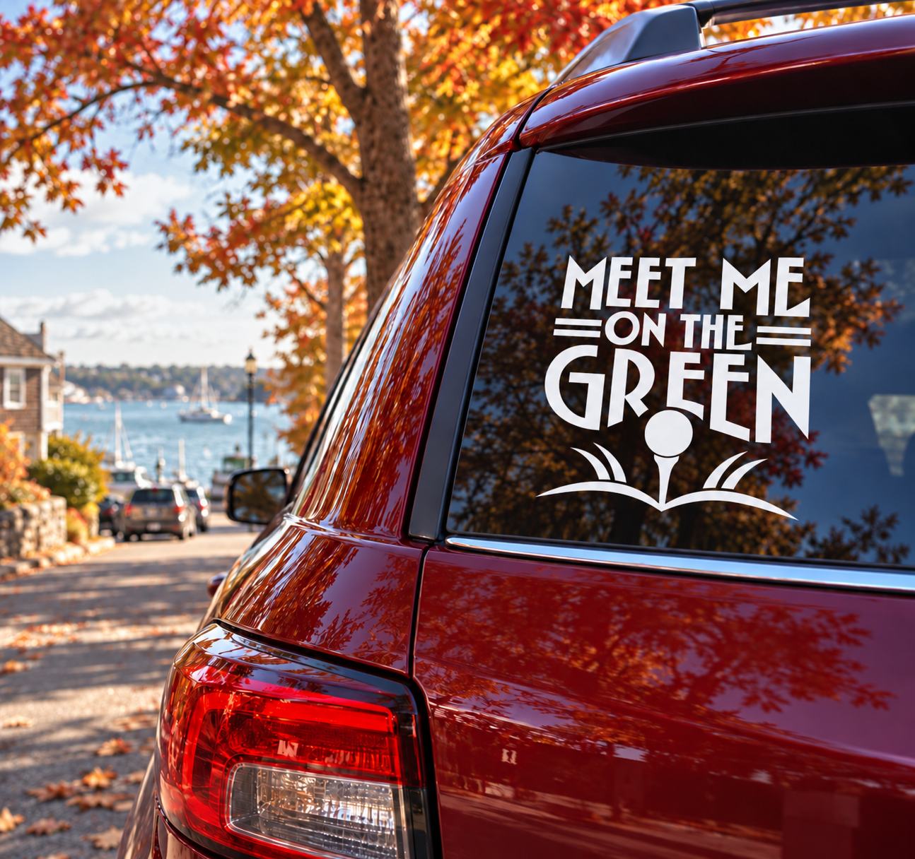 Golf-themed vinyl decal on car rear window: “Meet Me on the Green”