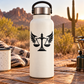 Black vinyl decal of a winged balance scale emblem on a bottle