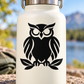 Black owl vinyl decal on light bottle, front view with wing and leaf details