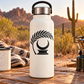 Black palm crescent vinyl decal with Greek key base on white bottle