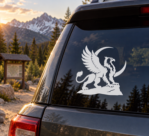 White winged griffin vinyl decal on dark vehicle window