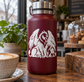 White griffin vinyl decal on a maroon drink bottle
