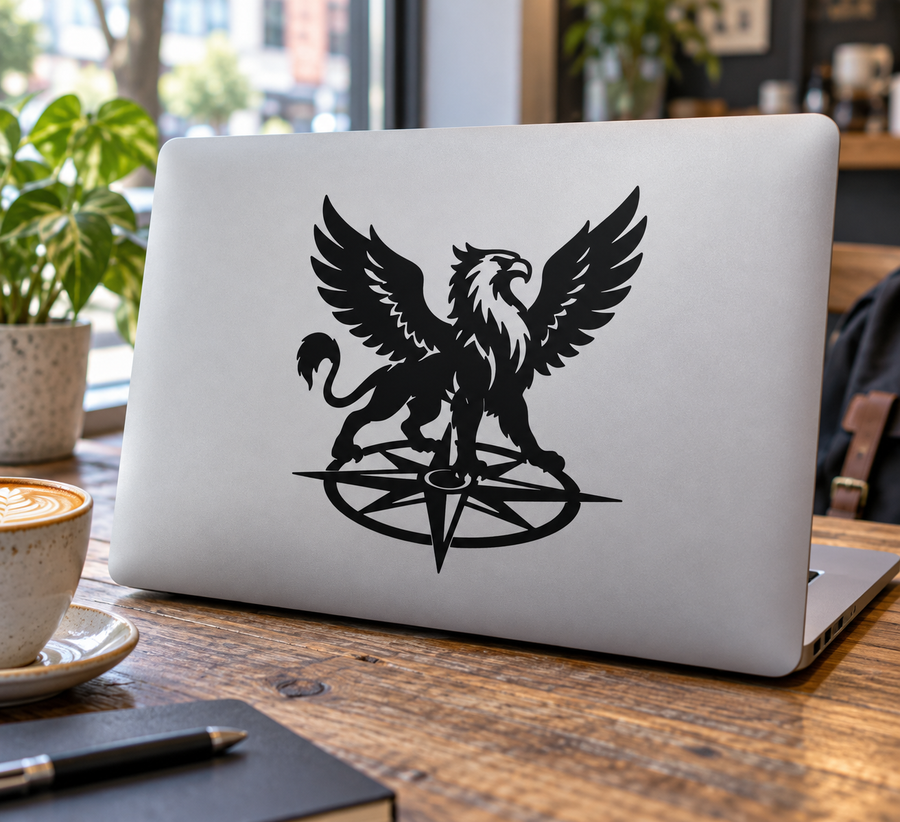 Black griffin wing compass emblem vinyl decal, centered on a surface