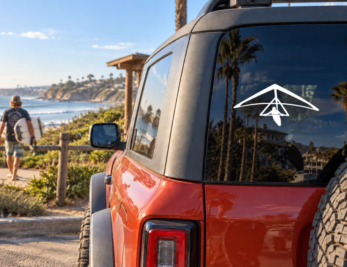 Hang gliding vinyl decal of white hang glider silhouette on car window