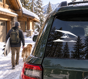 Hang gliding ridge lift vinyl decal on car window, black hang glider over mountain ridge