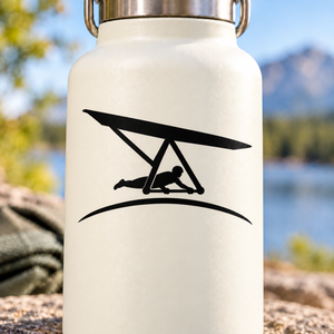 Black hang gliding horizon vinyl decal with silhouetted glider and curved base