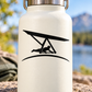 Black hang gliding horizon vinyl decal with silhouetted glider and curved base