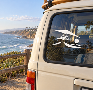 Vinyl hang gliding decal with desert thermals, mounted on a vehicle window