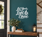Vinyl wall decal reading "Let Your Light Shine" with flame icon