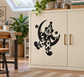 Black clown vinyl decal on crescent moon with stars and spot details