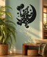 Black vinyl decal of a smiling clown on a crescent moon with balloons and stars
