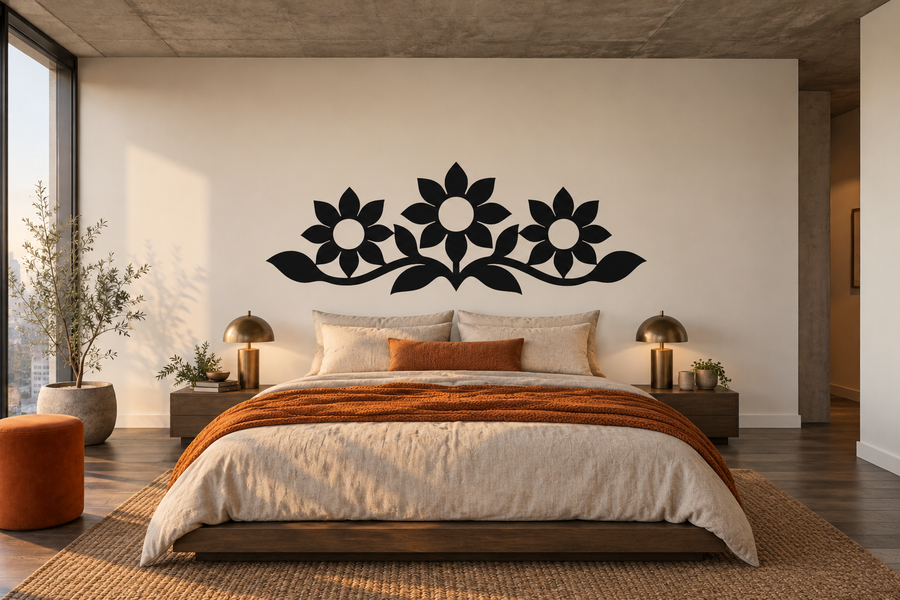 Sunflower garden vinyl wall decal with black floral vines above a bed headboard