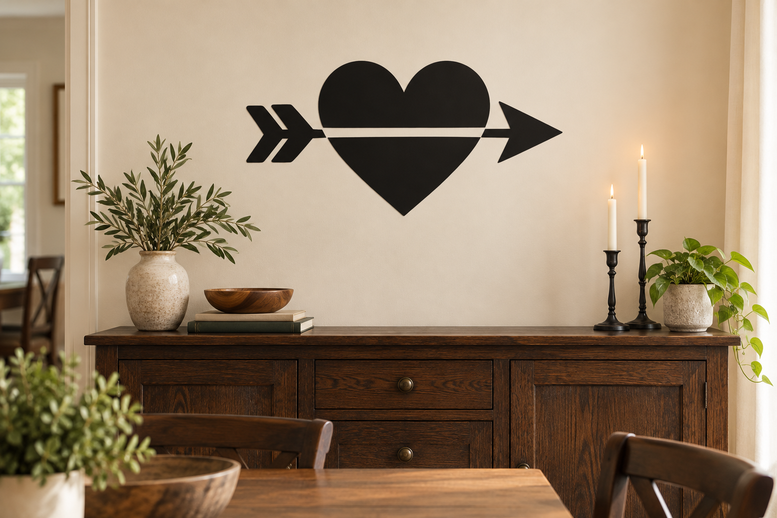 Black heart-and-arrow vinyl wall decal with centered heart and two-sided arrow