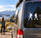 Vinyl hiking couple decal with two walking silhouettes on car window, white figures