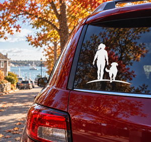 Hiking dog companion vinyl decal: hiker and dog silhouettes on mountain