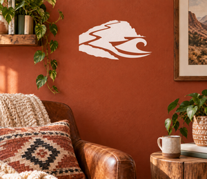 White vinyl decal of stylized hiker with coastal wave silhouette
