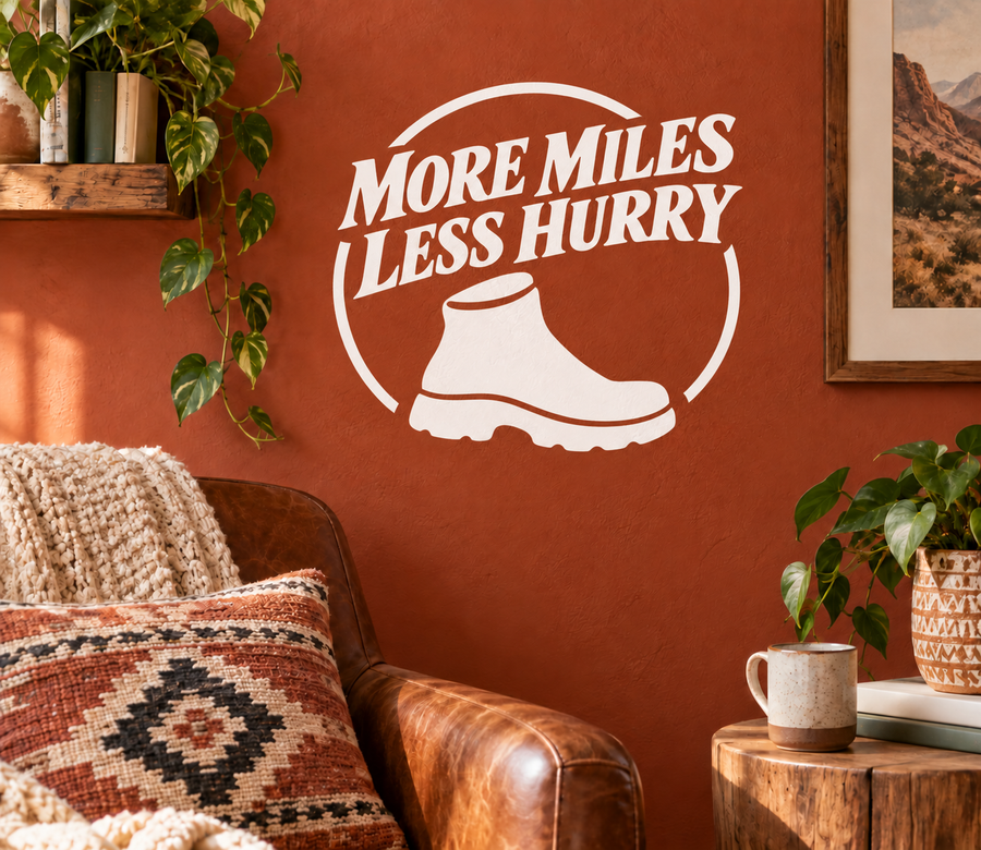 Vinyl hiking decal: 'MORE MILES LESS HURRY' with boot icon