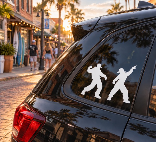 Pair of white hip-hop dancer vinyl decals on a vehicle rear window