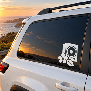 White speaker and bloom flower vinyl decal on a car side window