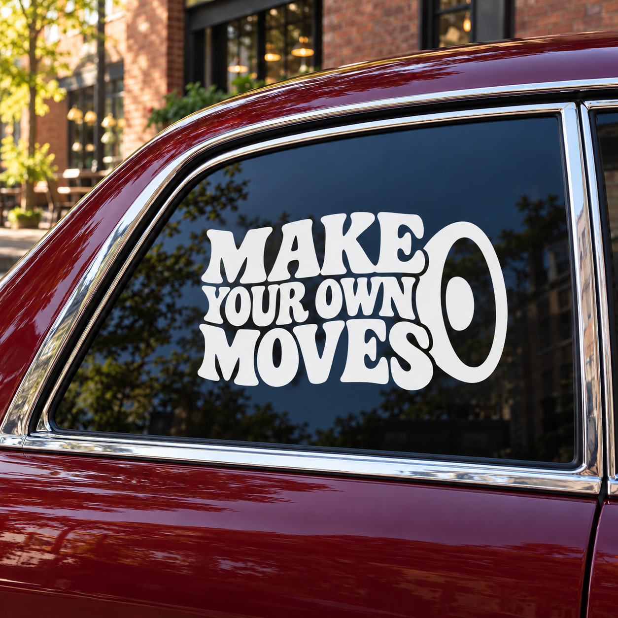White "MAKE YOUR OWN MOVES" vinyl decal for car window