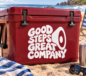 White “GOOD STEPS GREAT COMPANY” vinyl decal on red background
