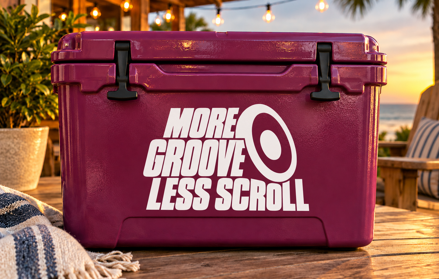 Vinyl decal with “MORE GROOVE LESS SCROLL” lettering in black and white.