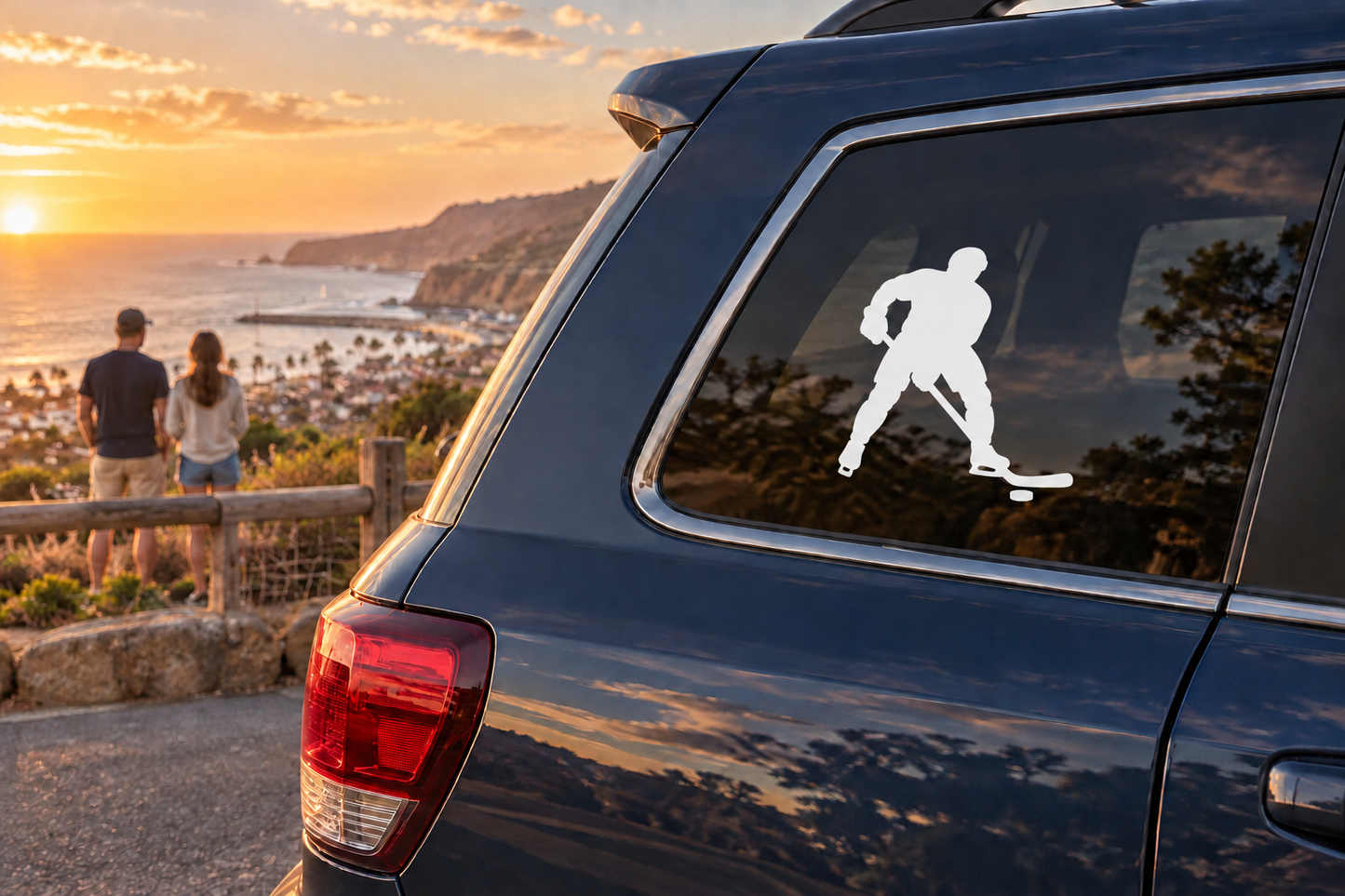 Hockey player vinyl decal on car rear window, white skating silhouette