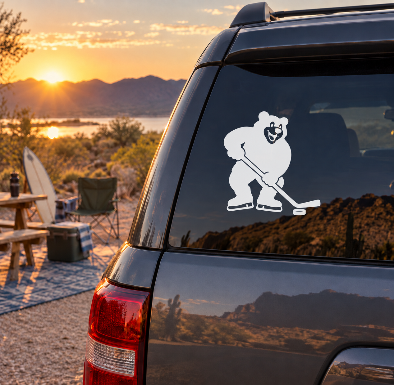 Hockey bear practice vinyl decal in white on a car window, holding a hockey stick
