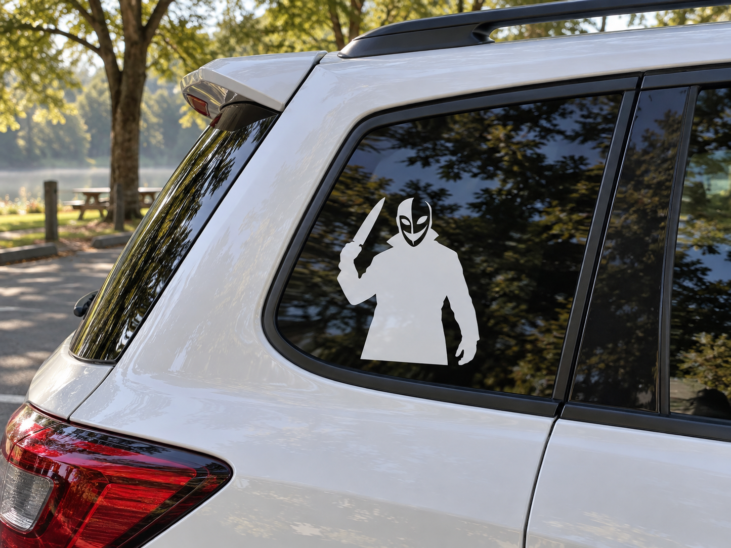 Car rear window vinyl decal: masked figure with dagger raised