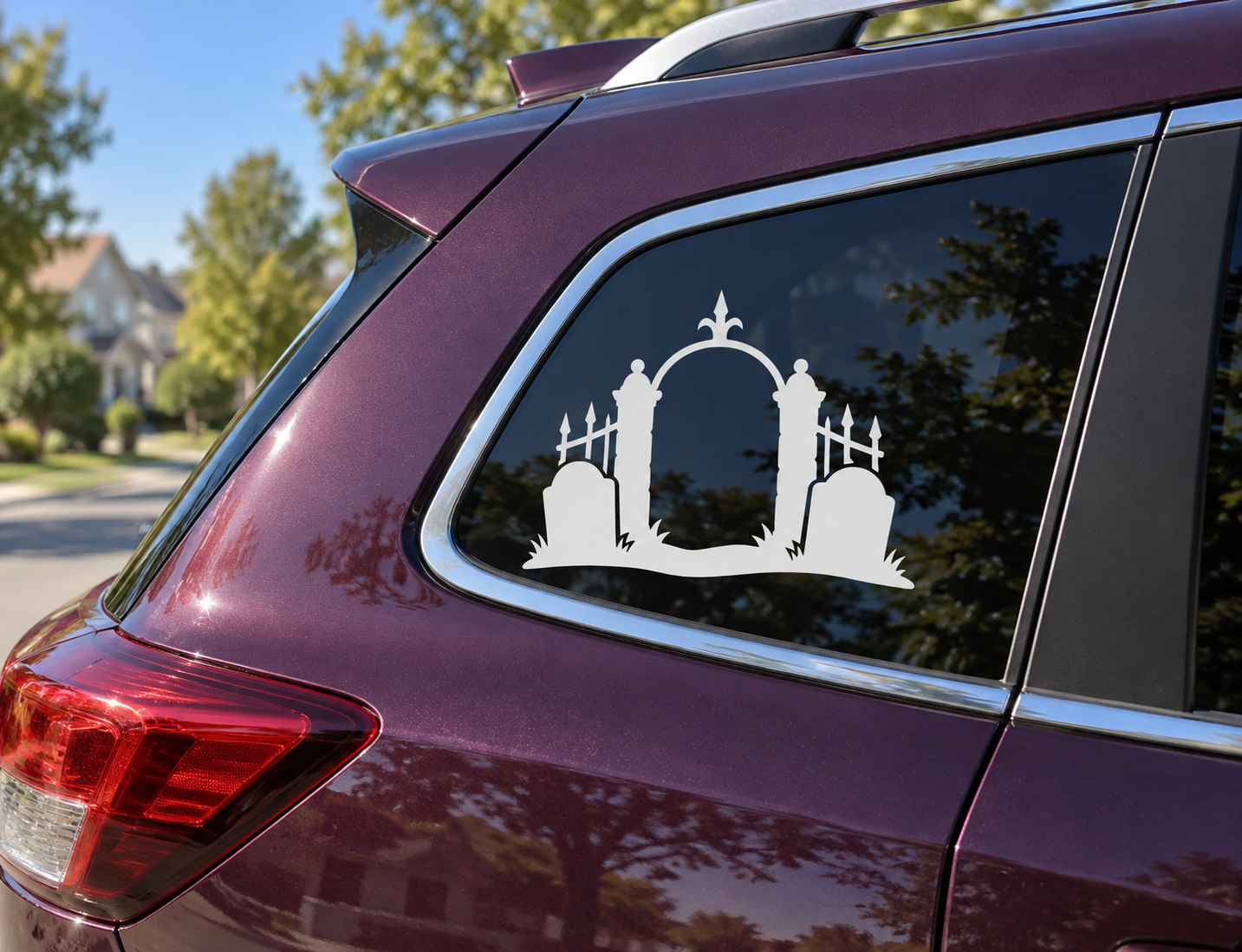Cemetery arch vinyl decal on car rear window with black church and graveyard silhouette