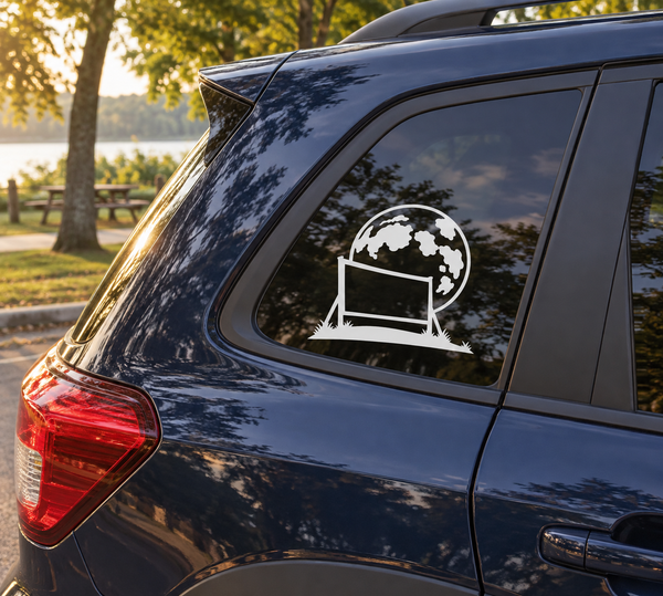 White crooked moon vinyl decal on car rear window, globe and screen
