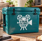 Final Frame Club horror vinyl decal on teal cooler, film reel icon and camera graphic