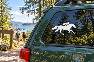 Horse racing vinyl decal with two white galloping horse silhouettes on a car window
