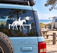 Horse racing rail vinyl decal with black rider and horse silhouettes on a car window.