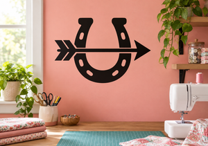 Black horseshoe vinyl decal with arrow, wall-ready shape for home decor