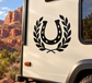Horseshoe and laurel vinyl decal, black horseshoe with laurel leaves on trailer