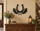 Black vinyl horseshoe wall decal with oak leaf accents