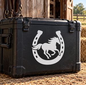 Horseshoe and running horse vinyl decal on dark surface with white graphic